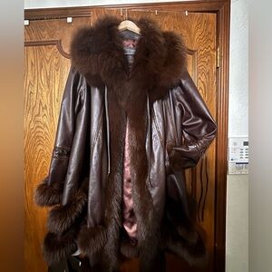 Brown Leather Swing Coat with Brown Fox
Fur side pockets draw string